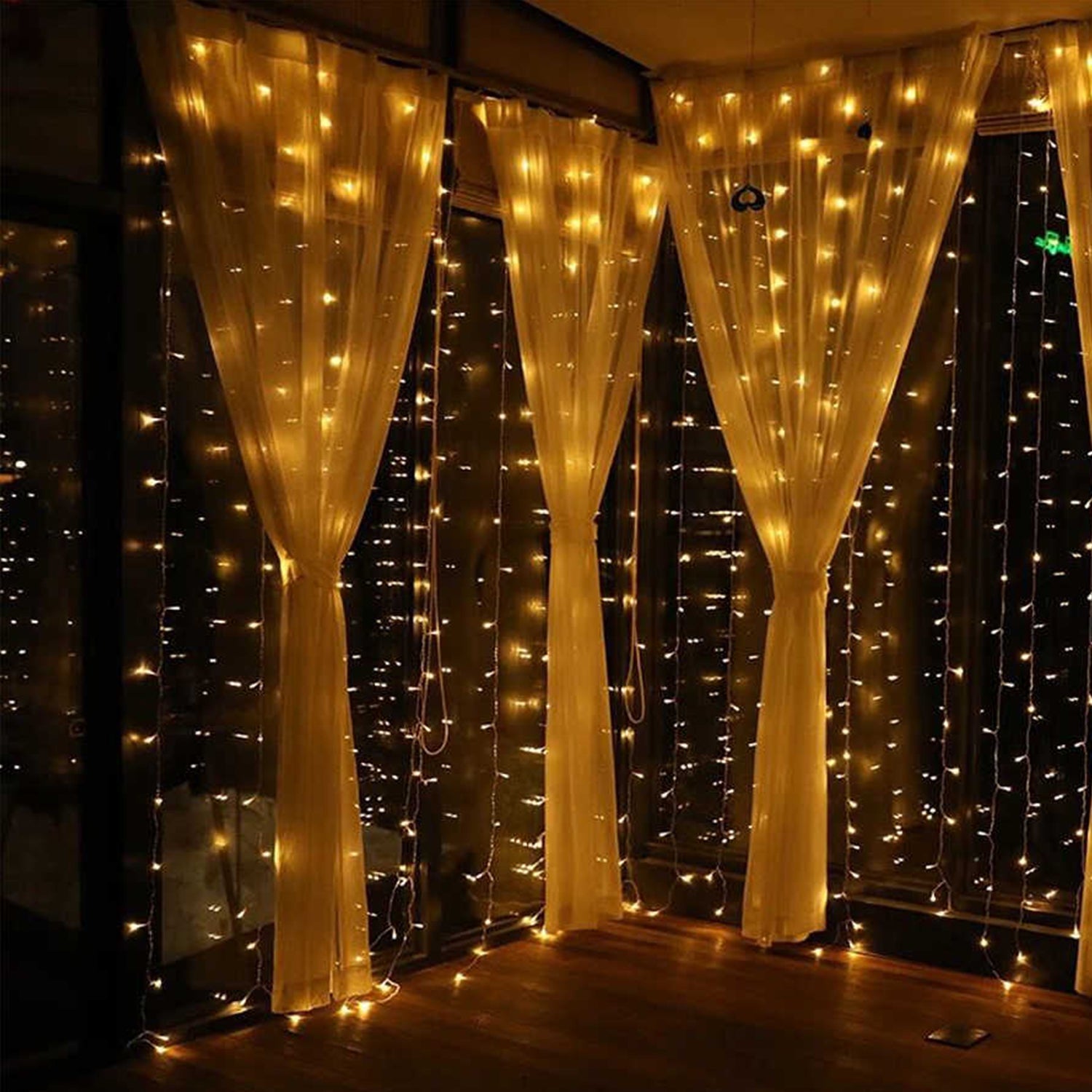 Fairy lights close-up on wooden floor