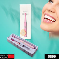 Travel electric toothbrush with battery and extra head