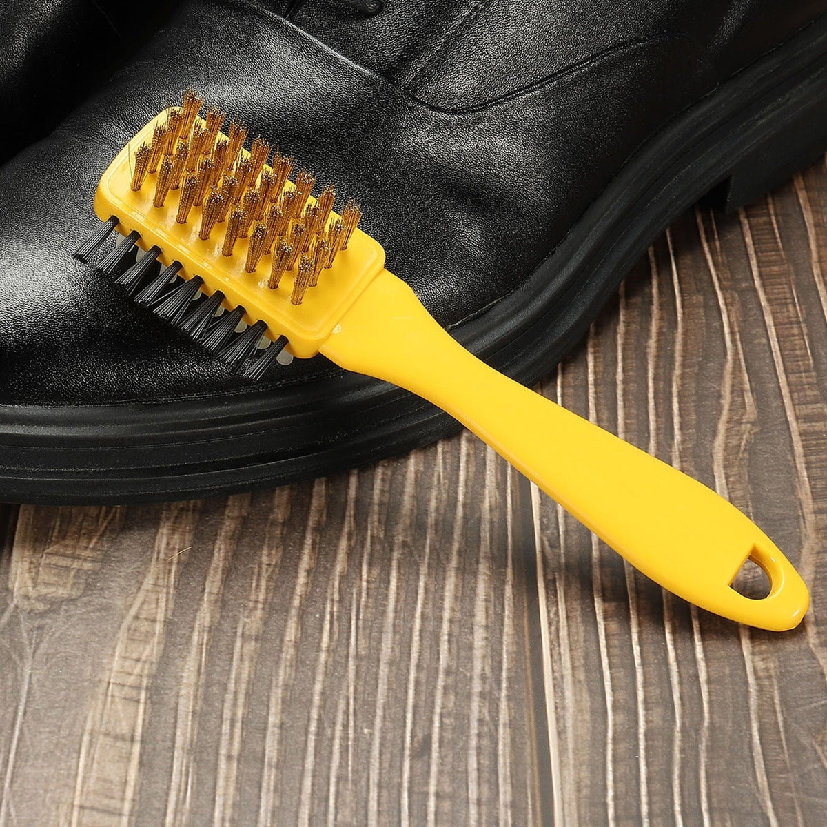 Portable 3-side shoe brush for cleaning suede and rubber shoes, multifunctional and durable.