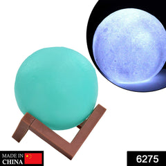 Blue moon lamp with a wooden stand, ideal for bedroom lighting.