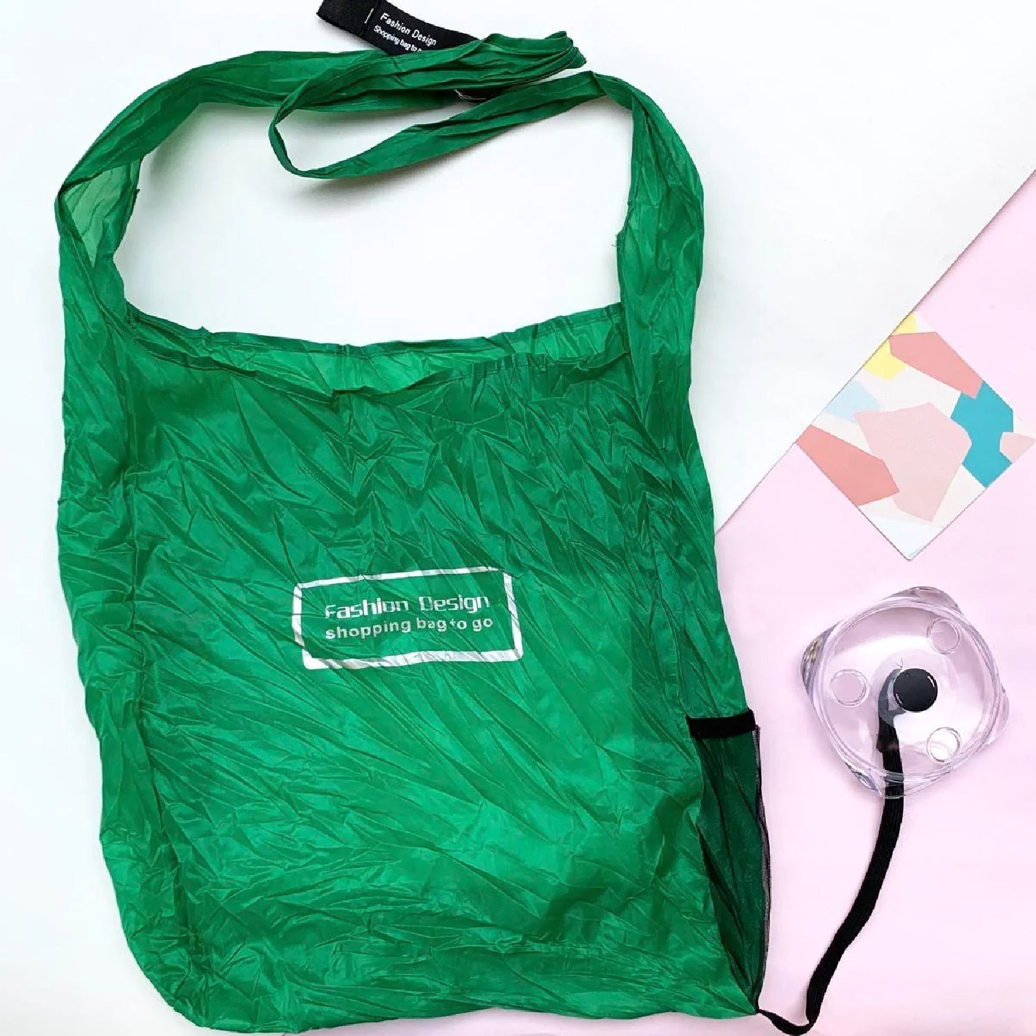 Nylon grocery bag that folds into a small case for easy portability.